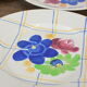 Lot de 12 assiettes motif fleurs de champagne.