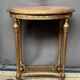 French Louis XVI style giltwood table. Marble top. Late 19th century.