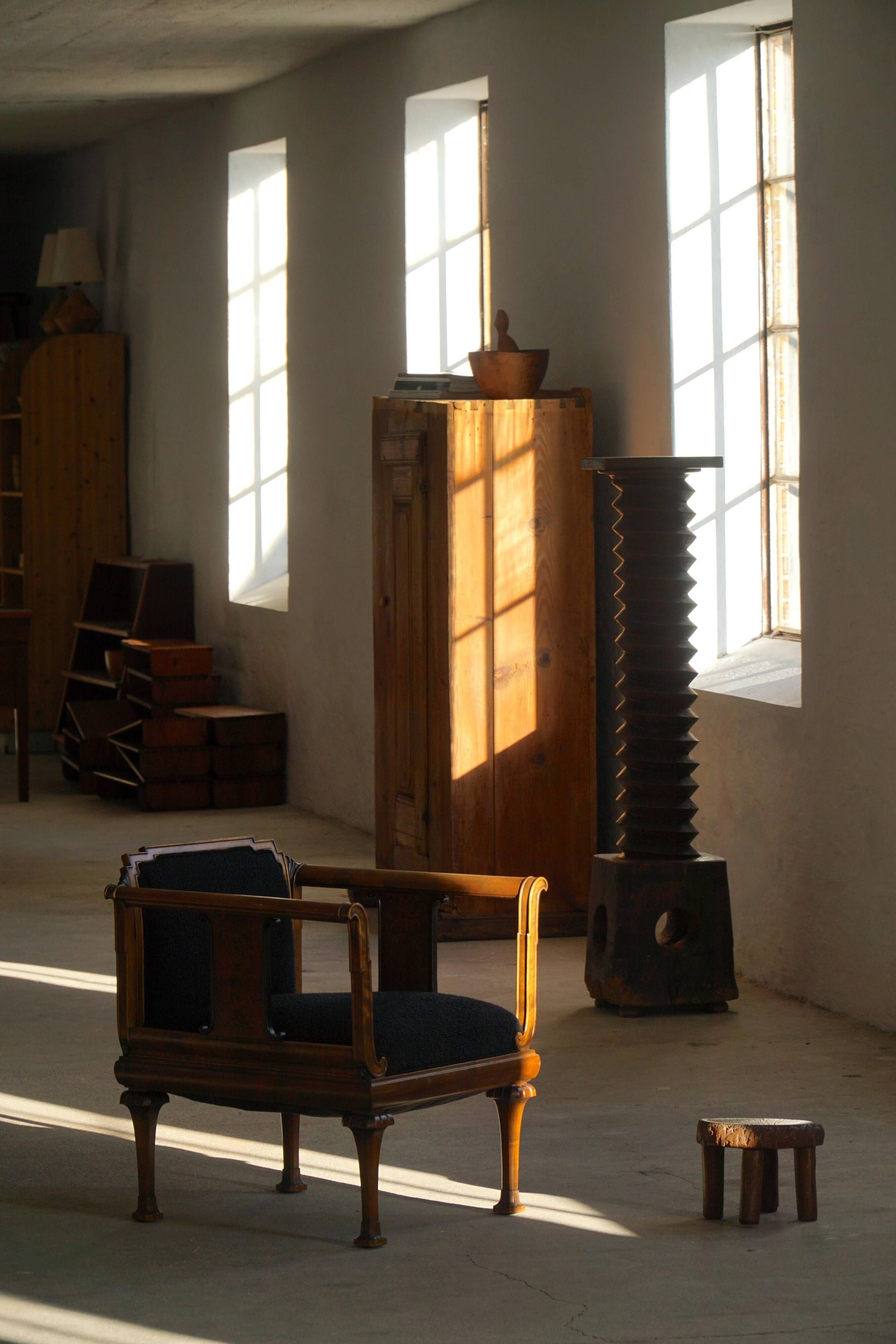 Early 20th century Danish Art Nouveau armchair, reupholstered in charcoal boucle.