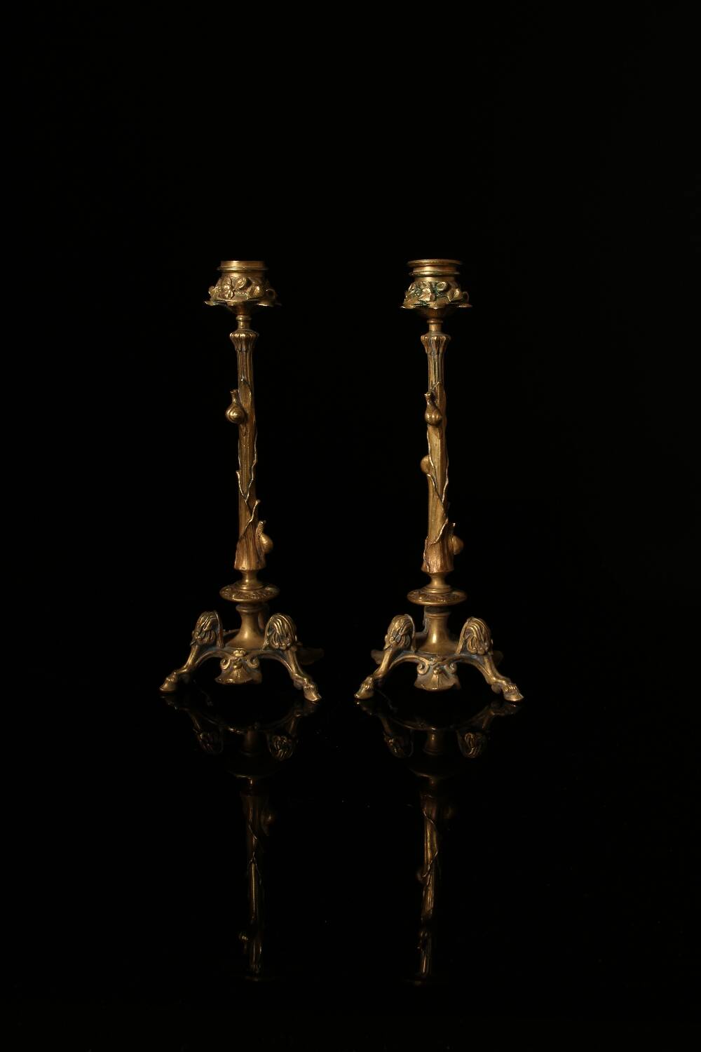 Pair of tripod candlesticks by Paul-Auguste Gagné (19th century)