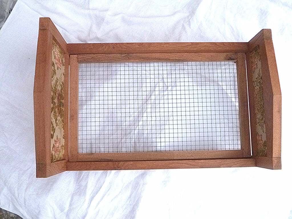 Vintage handcrafted wooden doll bed