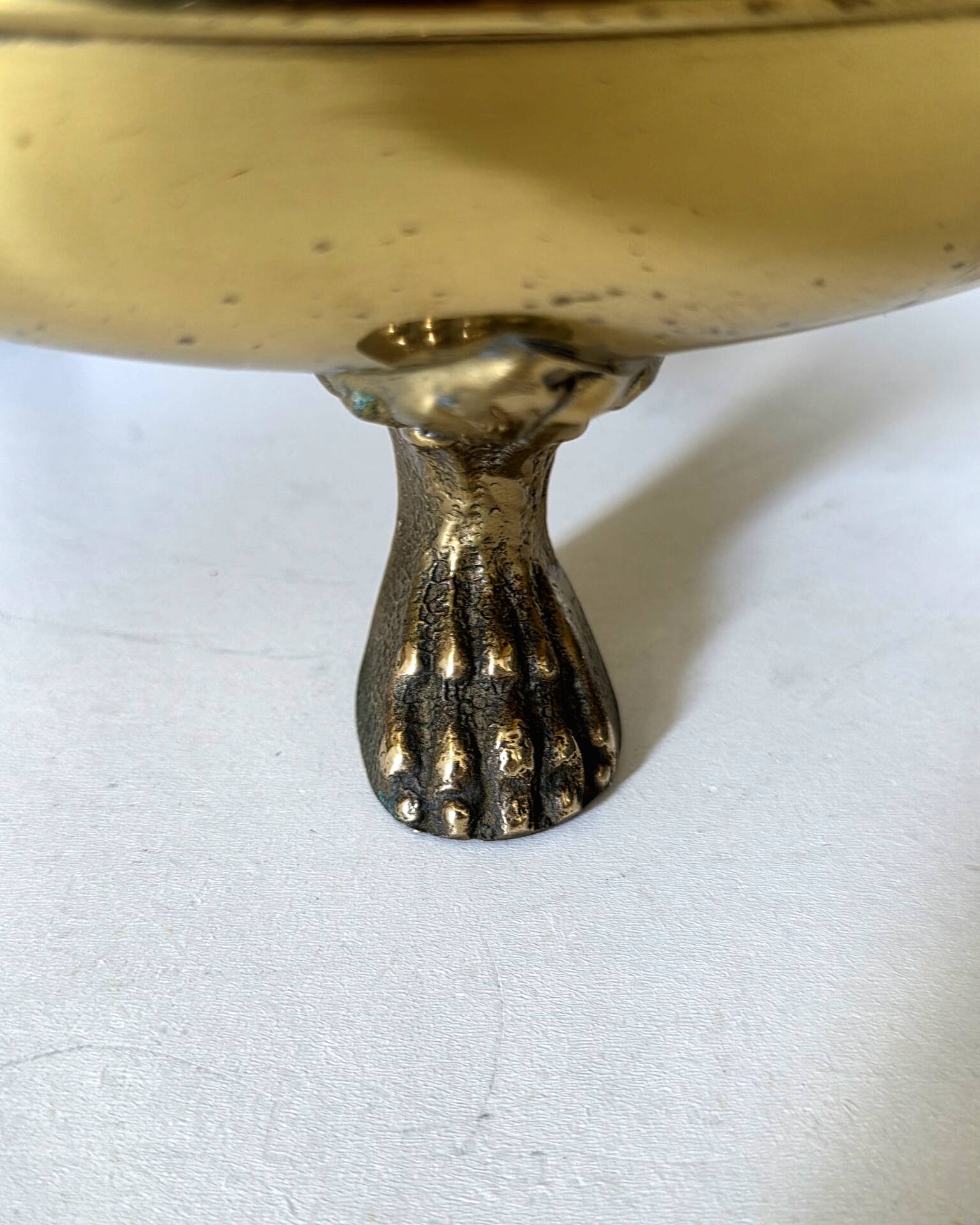 Hollywood Regency style umbrella stand, brass finish and lio pattern.