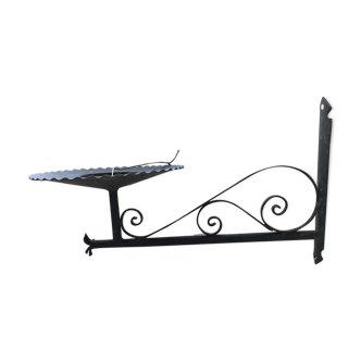 Black wrought iron wall sconce