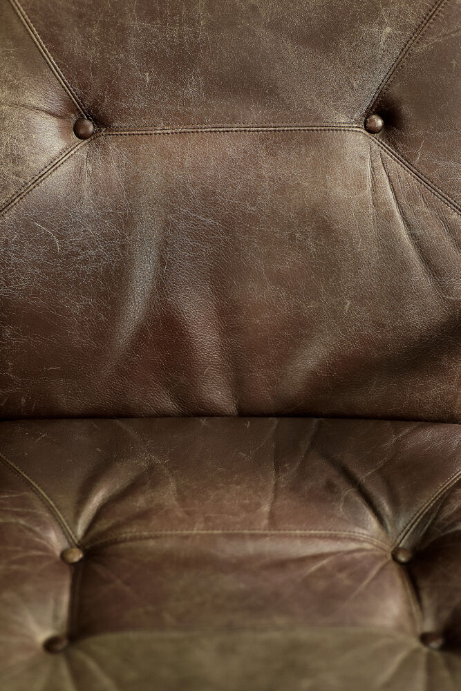 Modern vintage Danish armchair in beech and brown leather by Farstrup Møbler, 1970.