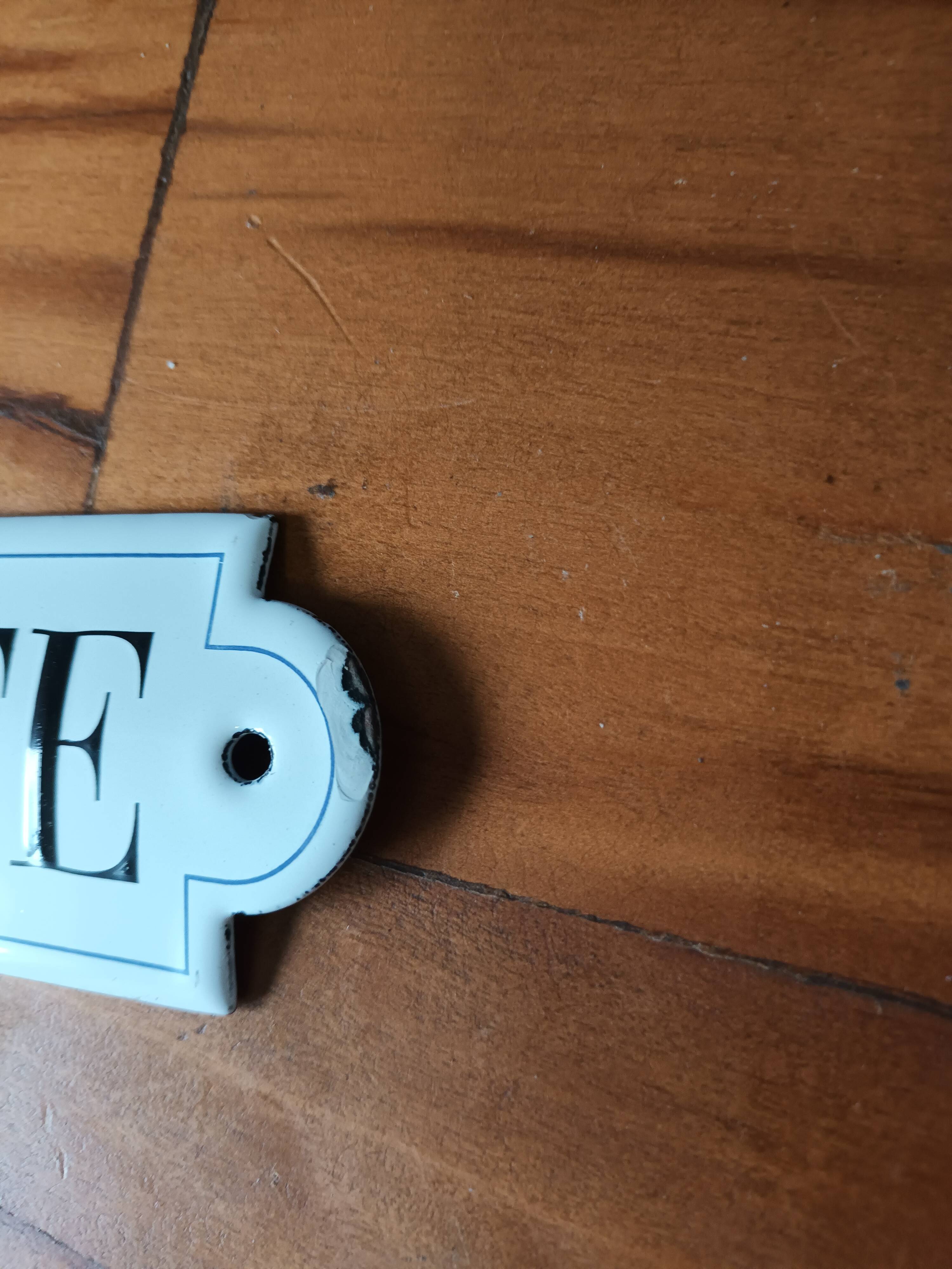 Doorbell enamel plate