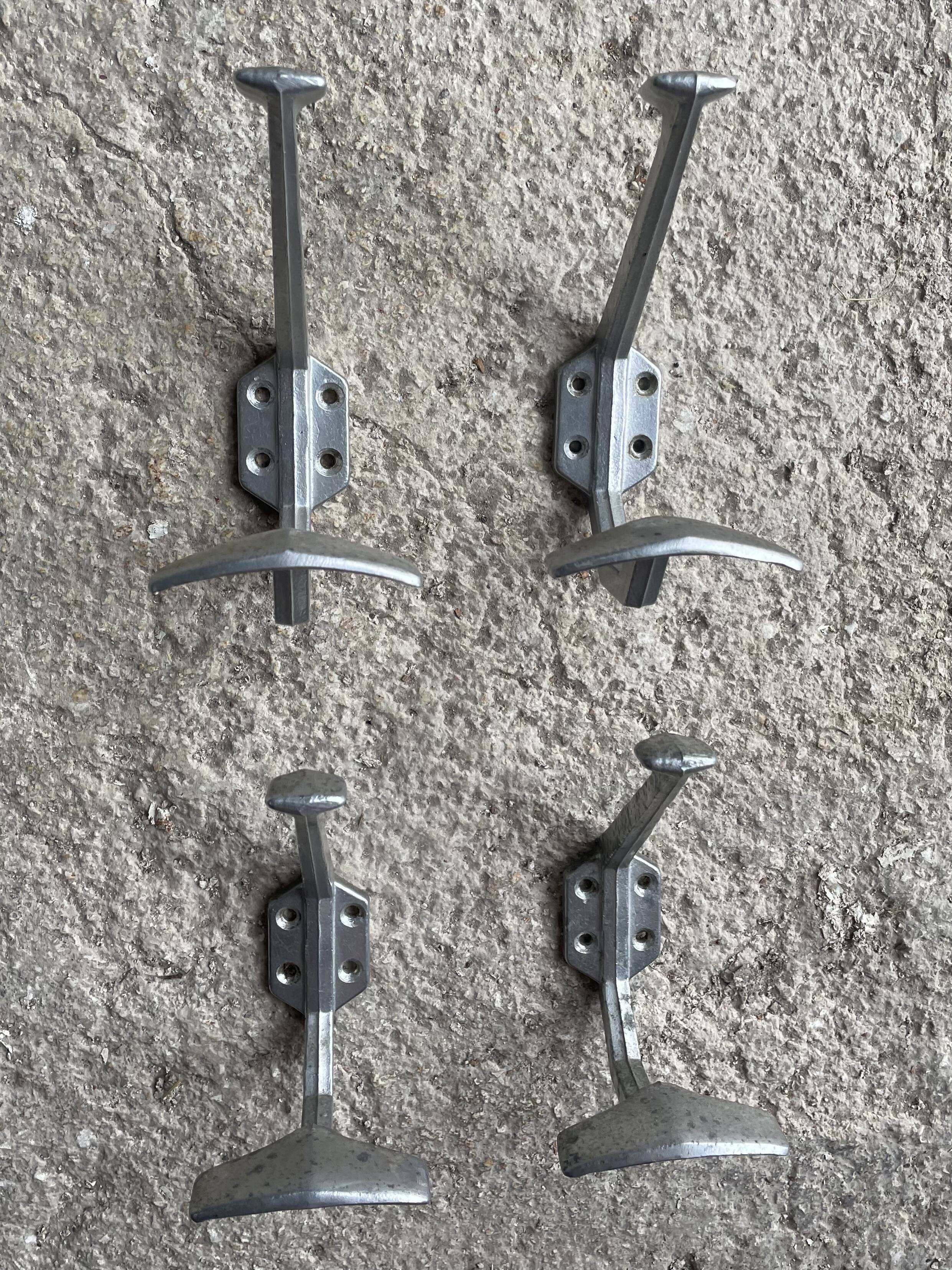 Set of 4 old metal coat hooks