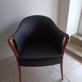 Pair of leather and wood armchairs in the Umberto Asnago style.