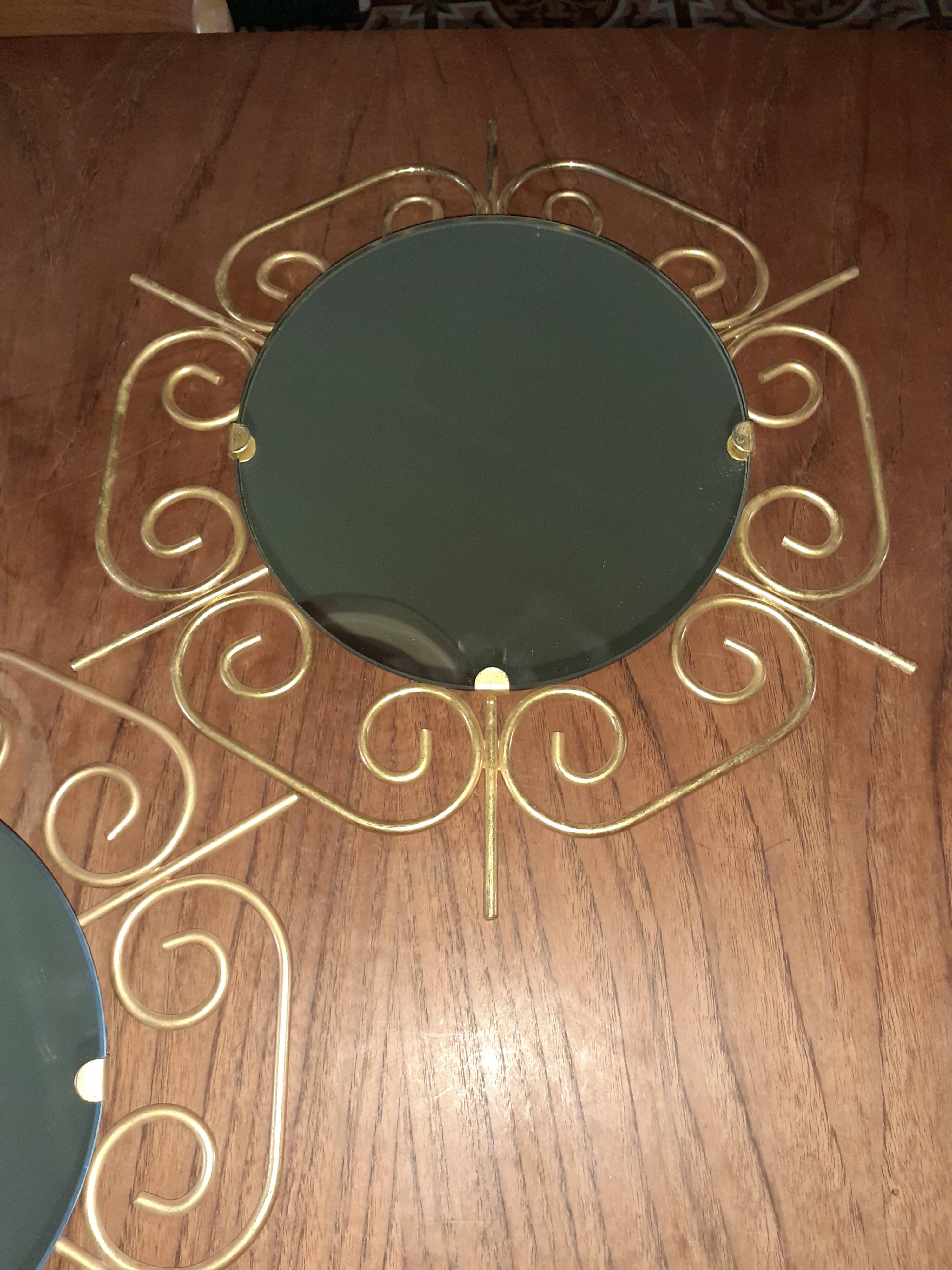 Pair of 60s golden metal mirrors