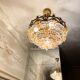 Exceptional vintage chandelier in Murano style crystal, orange, brass.