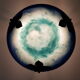 Blue glass paste and wrought iron basin suspension