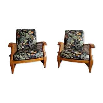 Pair of canned studio armchairs