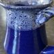 Small enamelled earthenware milk jug