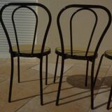 4 Chaises bistrot en métal noir et assise cannage plastique