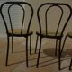 4 Black metal bistro chairs with plastic cane seat