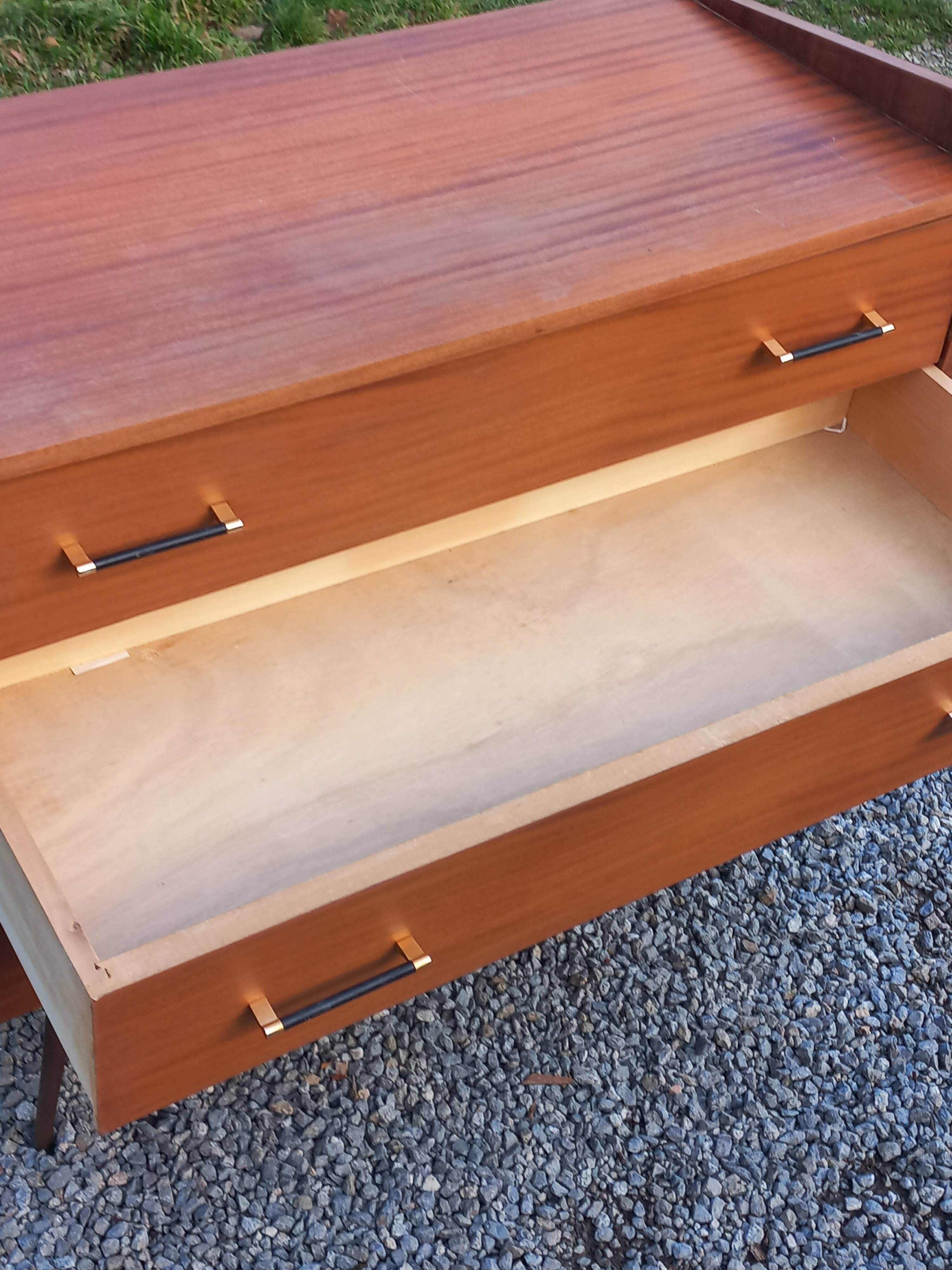 Vintage mahogany commode with metal tapered legs, 4 drawers, 1950s.