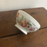 Vintage small antique bowl with floral decoration.