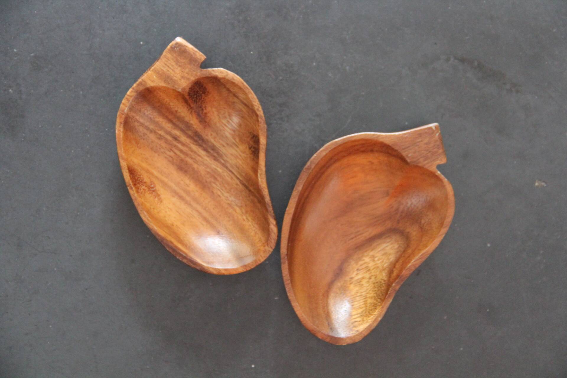 2 teak leaf-shaped trays