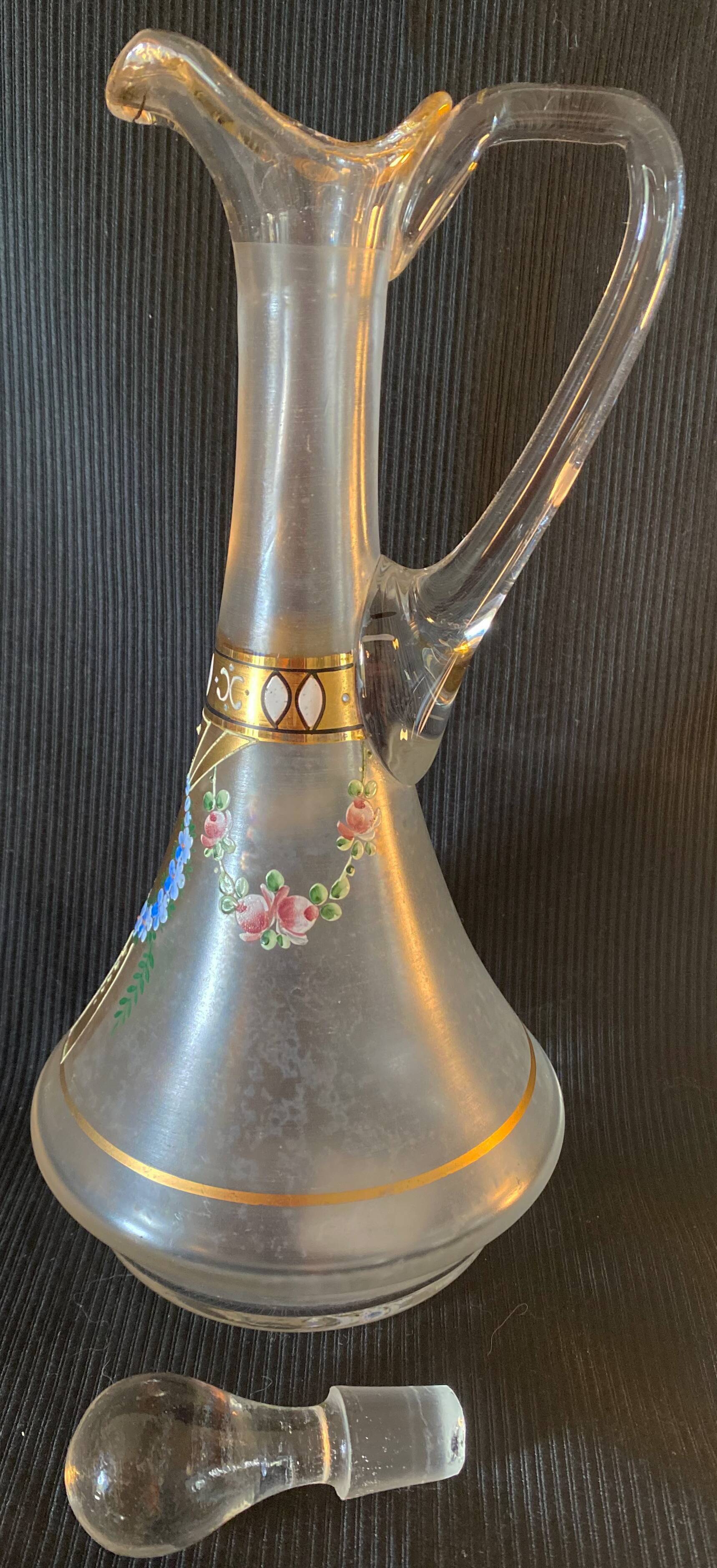 Small glass decanter decorations of enamel flower garland late nineteenth early twentieth