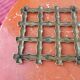 Bronze trivet in the style of bamboo, circa 1960