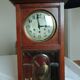 Wooden clock with beveled glass