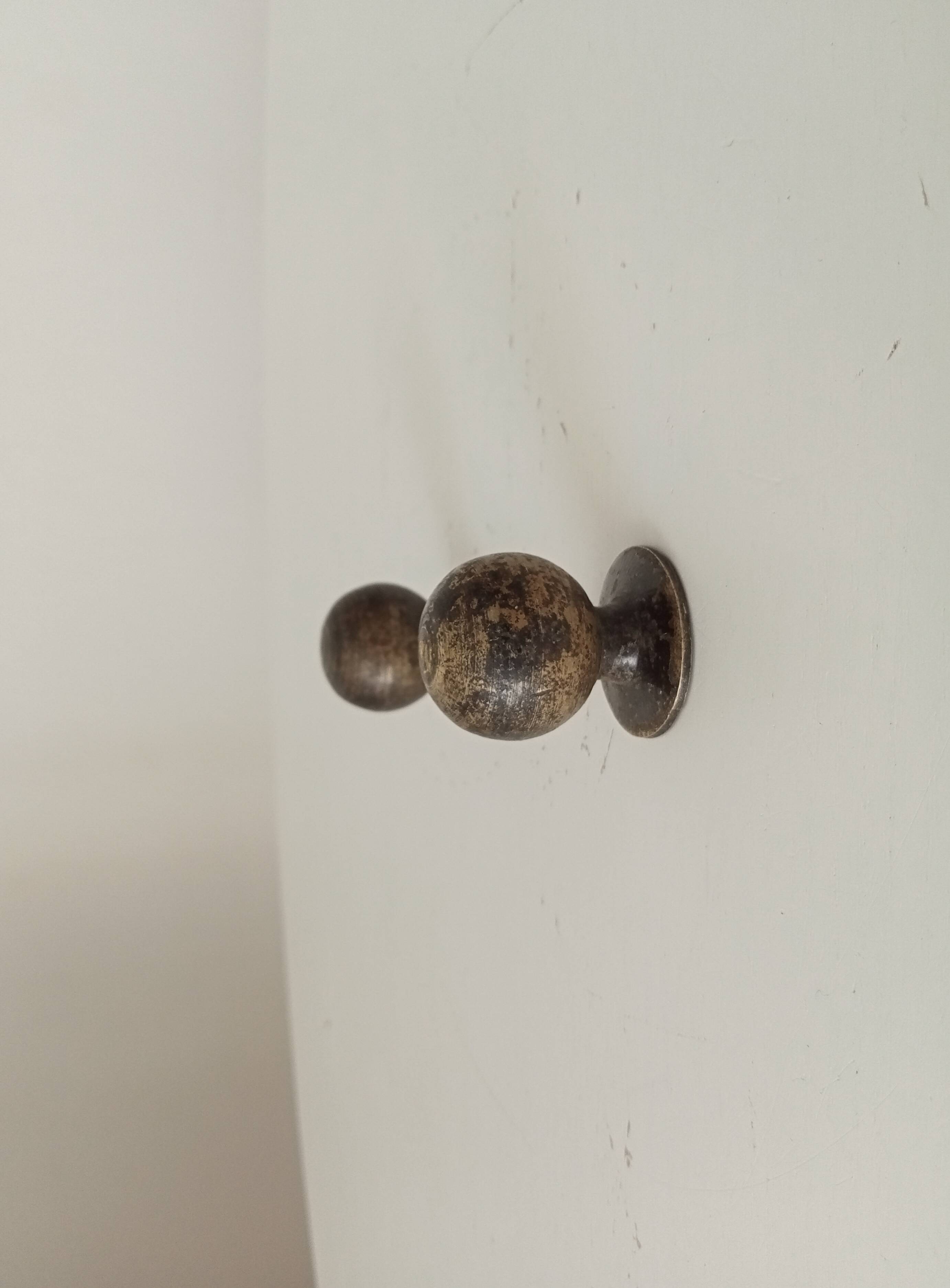 Pair of antique bronze furniture handles.