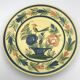 Assiette ancienne en faïence hb henriot quimper décor de panier floral et oiseau
