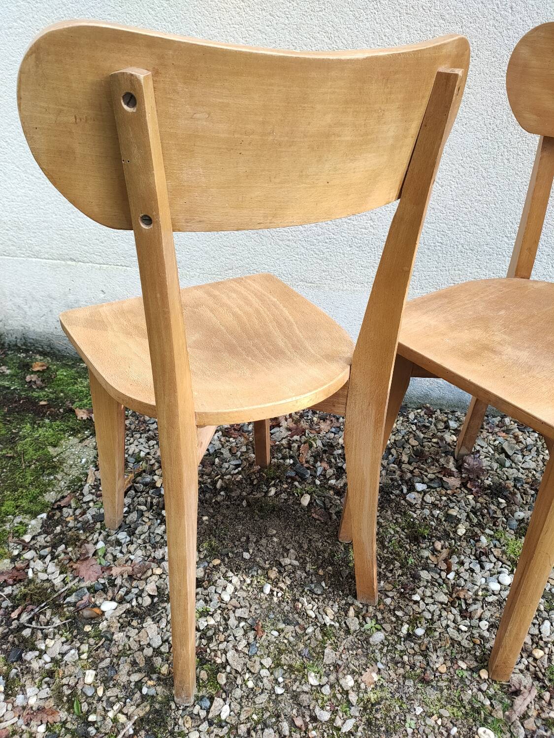 Pair of vintage solid wood bistro chairs