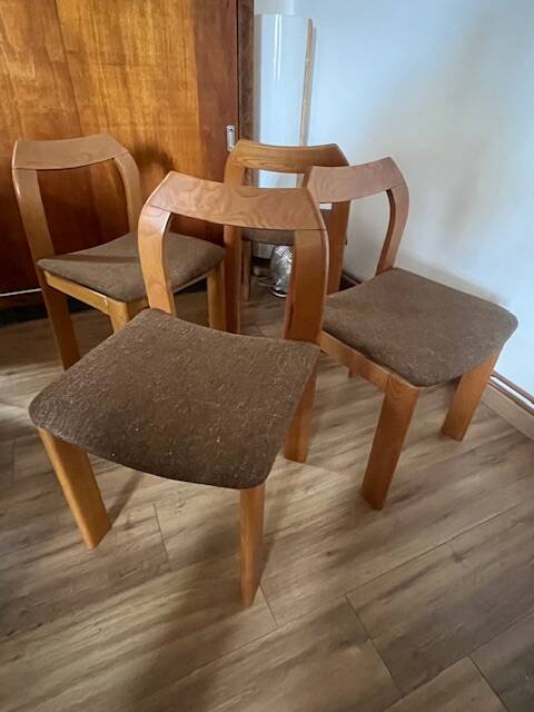4 brown chairs