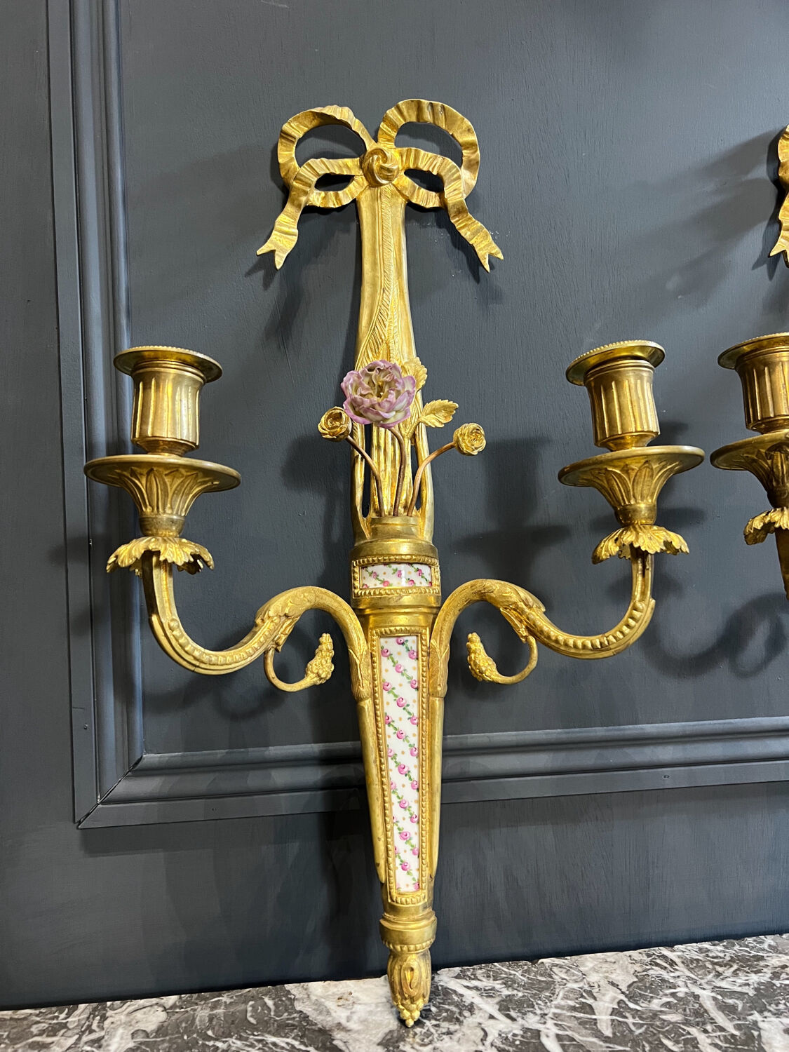 Pair of nineteenth century sconces in bronze and porcelain