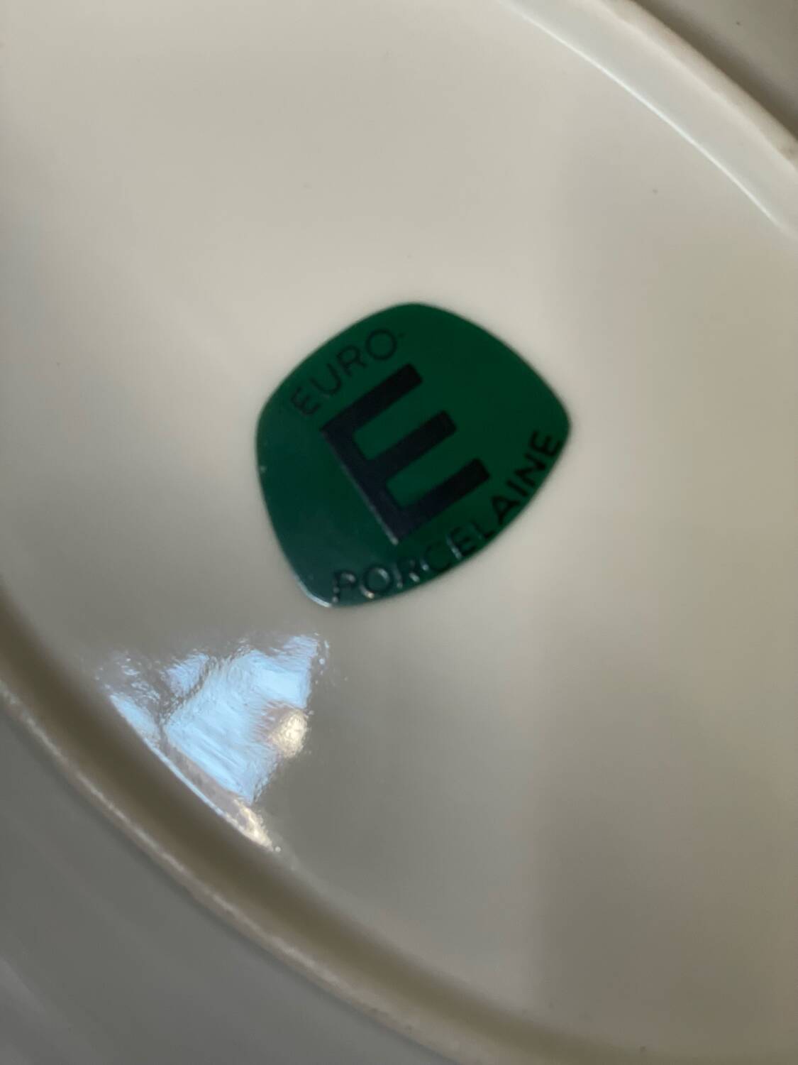 2 oval porcelain dishes with a floral pattern