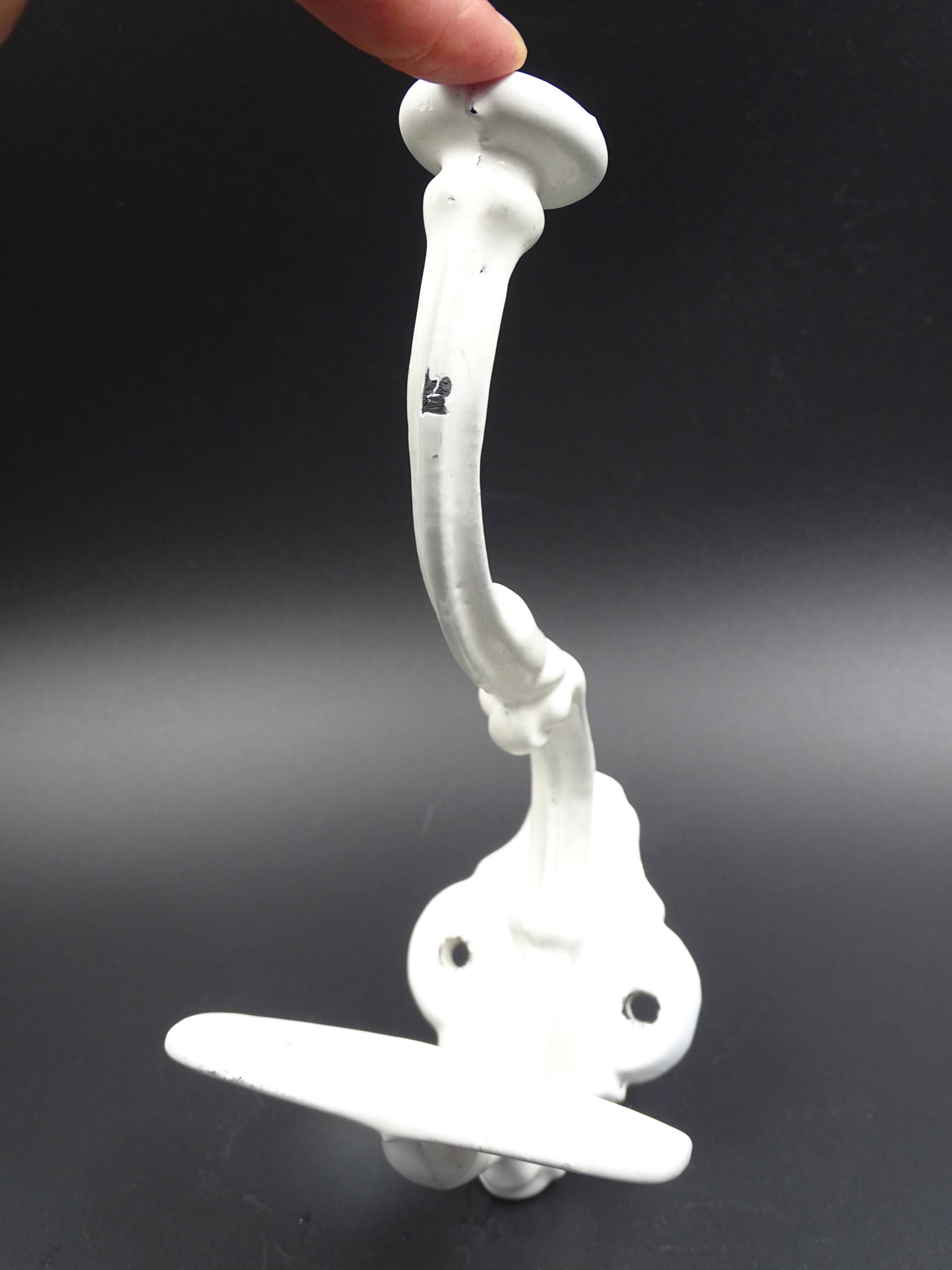 Old white enamelled metal patère