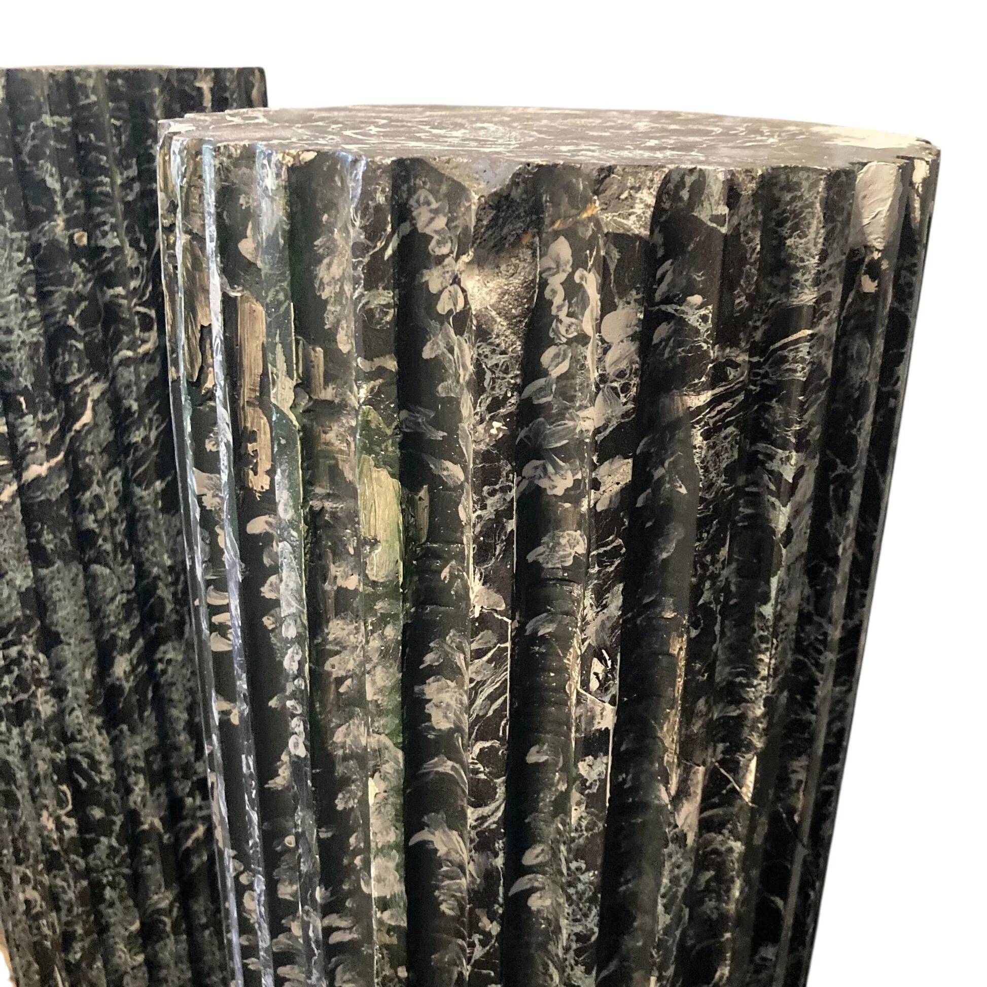 Pair of black and green scagliola columns from the 19th century.