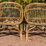 Pair of 1950s rattan armchairs from France.