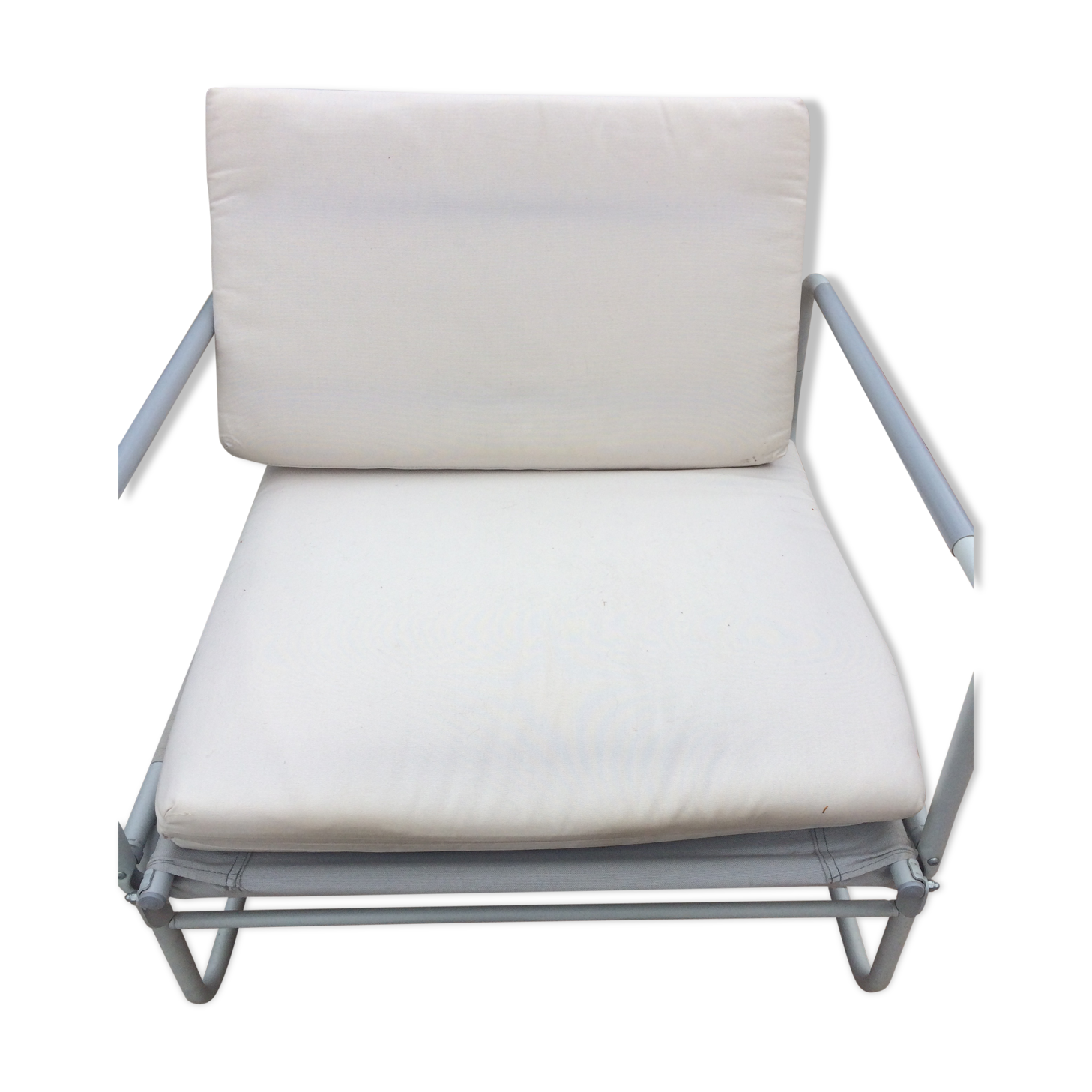 Chair - beige bed with cushions removable.