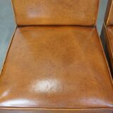 Set of 4 sheepskin dining chairs in light cognac color