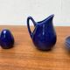 Swedish Salier Mid-Century Bla Eld, Salt Shaker, Milk Jug, Saucer and Plate by Hertha Bengtson for Rörstrand, 1960s, Set of 4