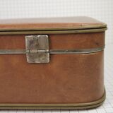 Cardboard and brown leather case