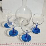 Old carafe and its wine glasses