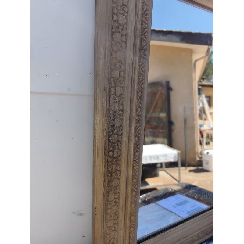 Wood and gilded stucco mirror, 19th century
