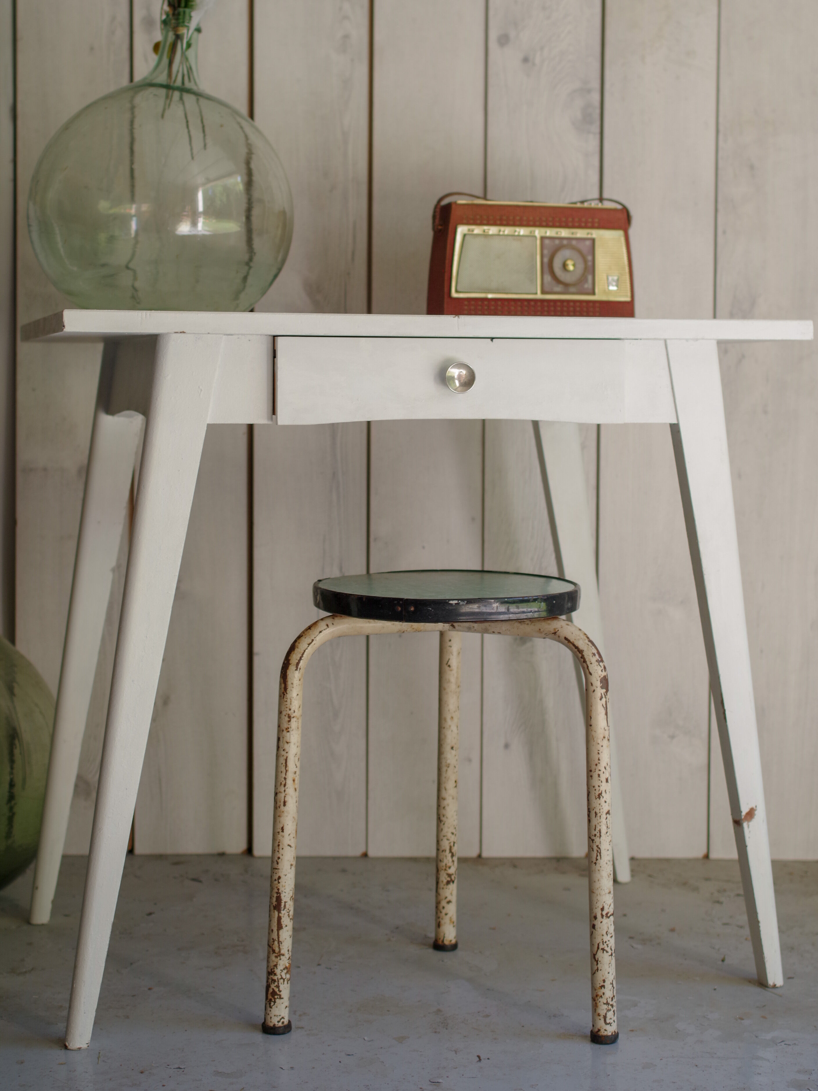 White compass feet table