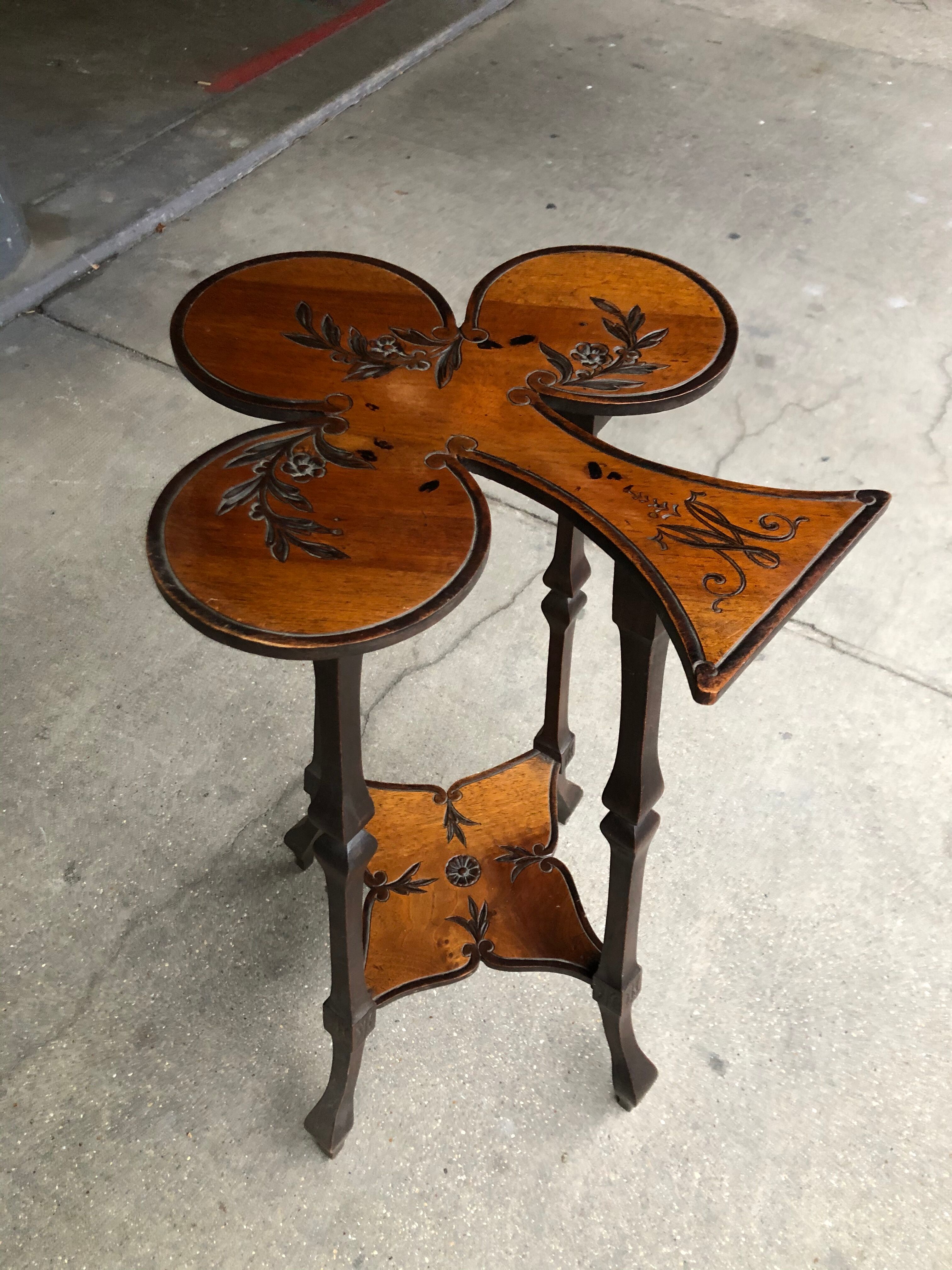 Art nouveau table with a pyrograved decoration