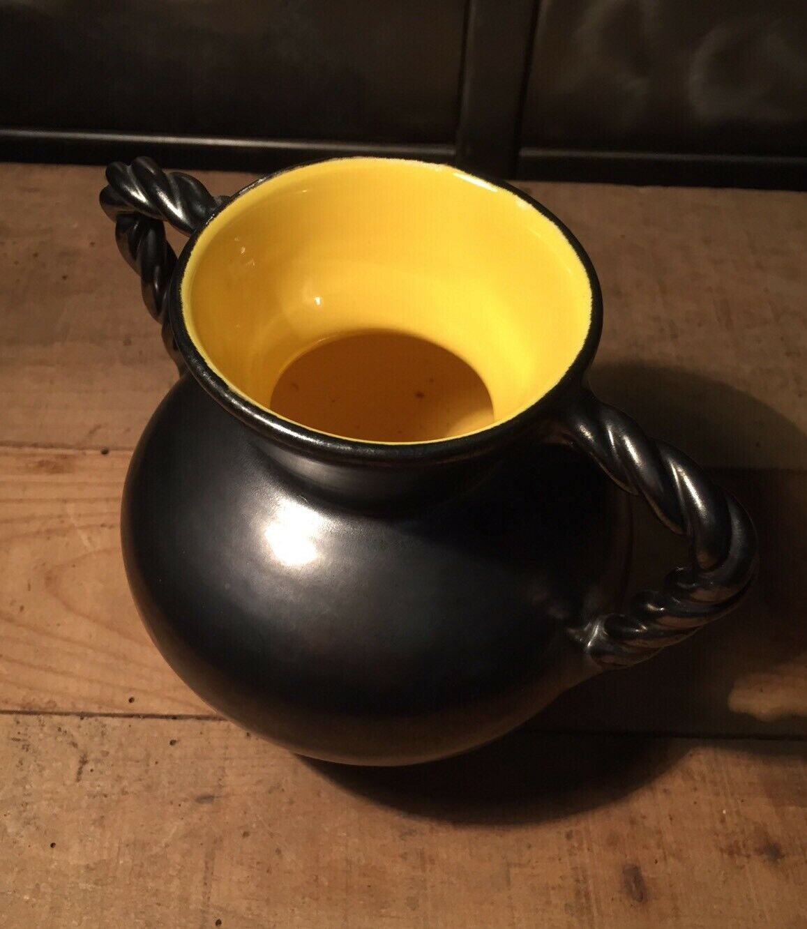 Iridescent black and yellow ceramic vase