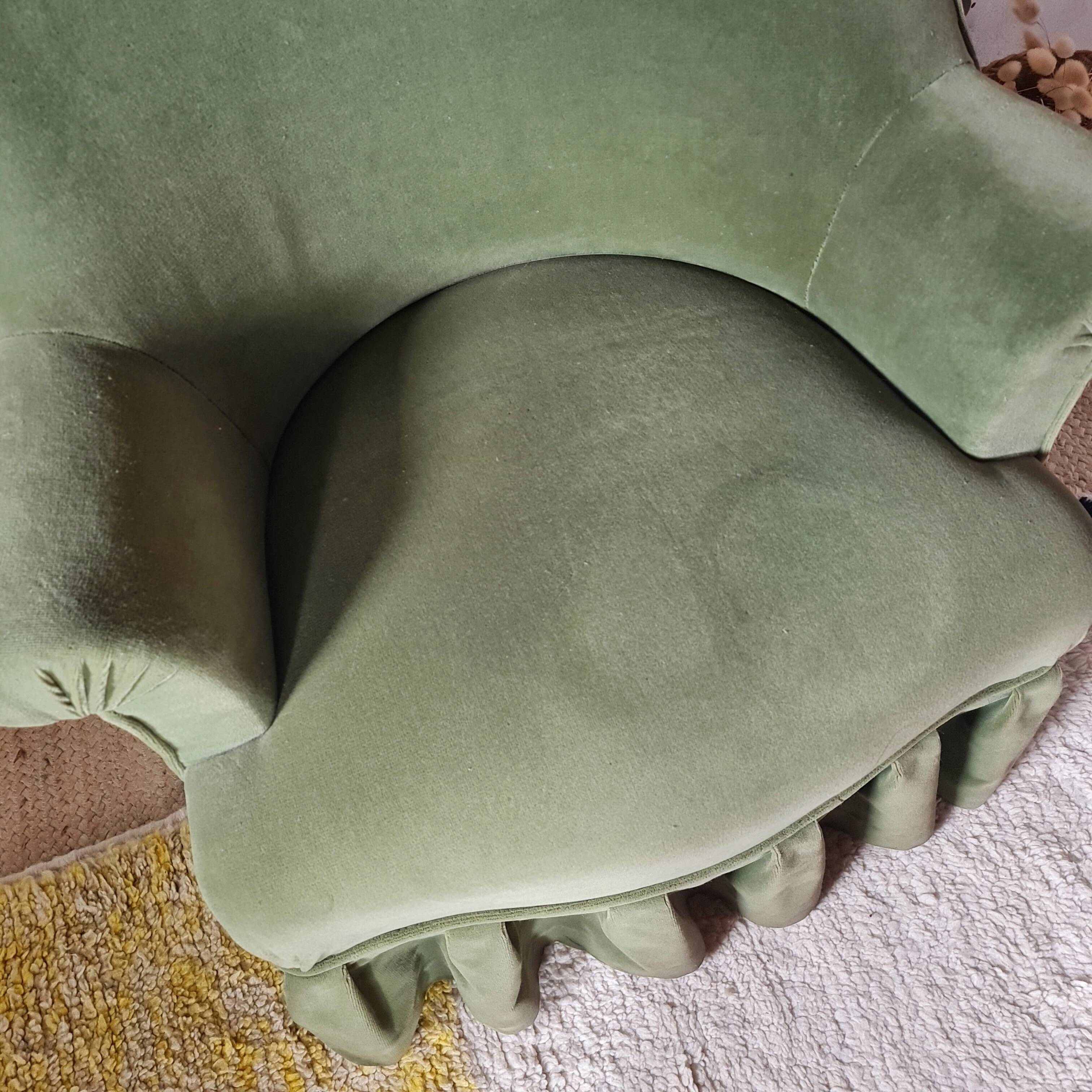 Green velvet armchair