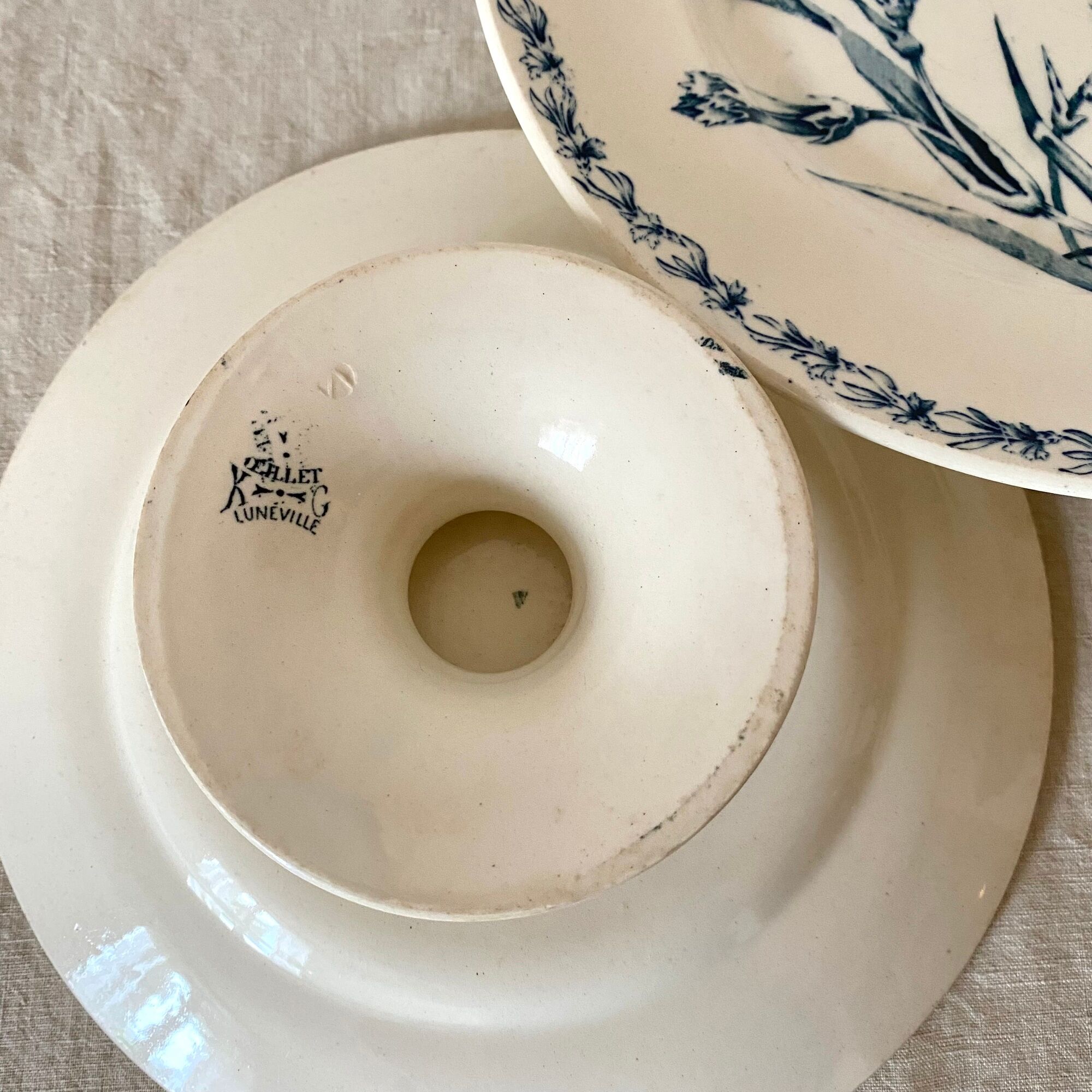 Antique dishes on foot in Luneville carnation porcelain