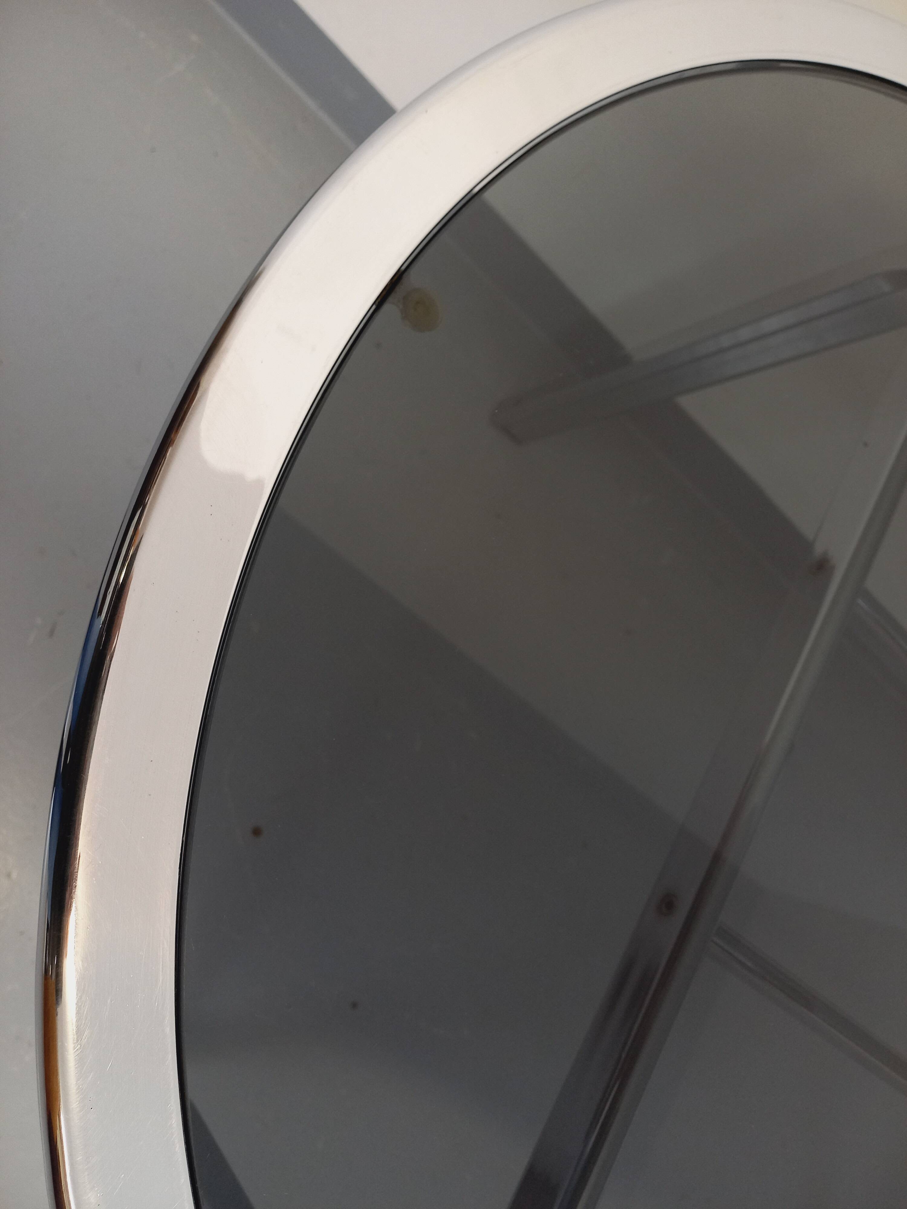 Vintage oval dining table in smoked glass and chrome metal, Space Age style.