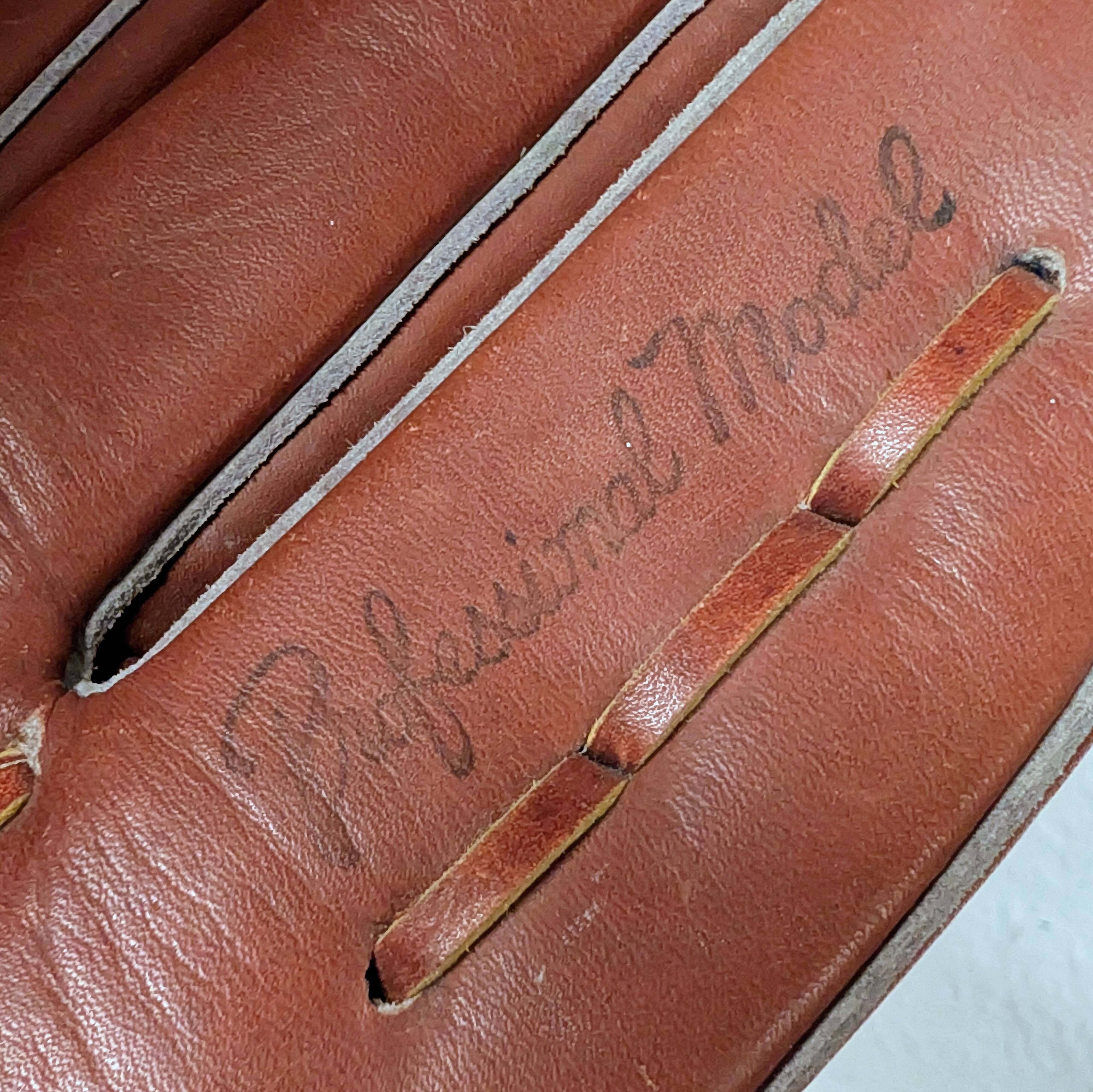 Baseball glove and ball