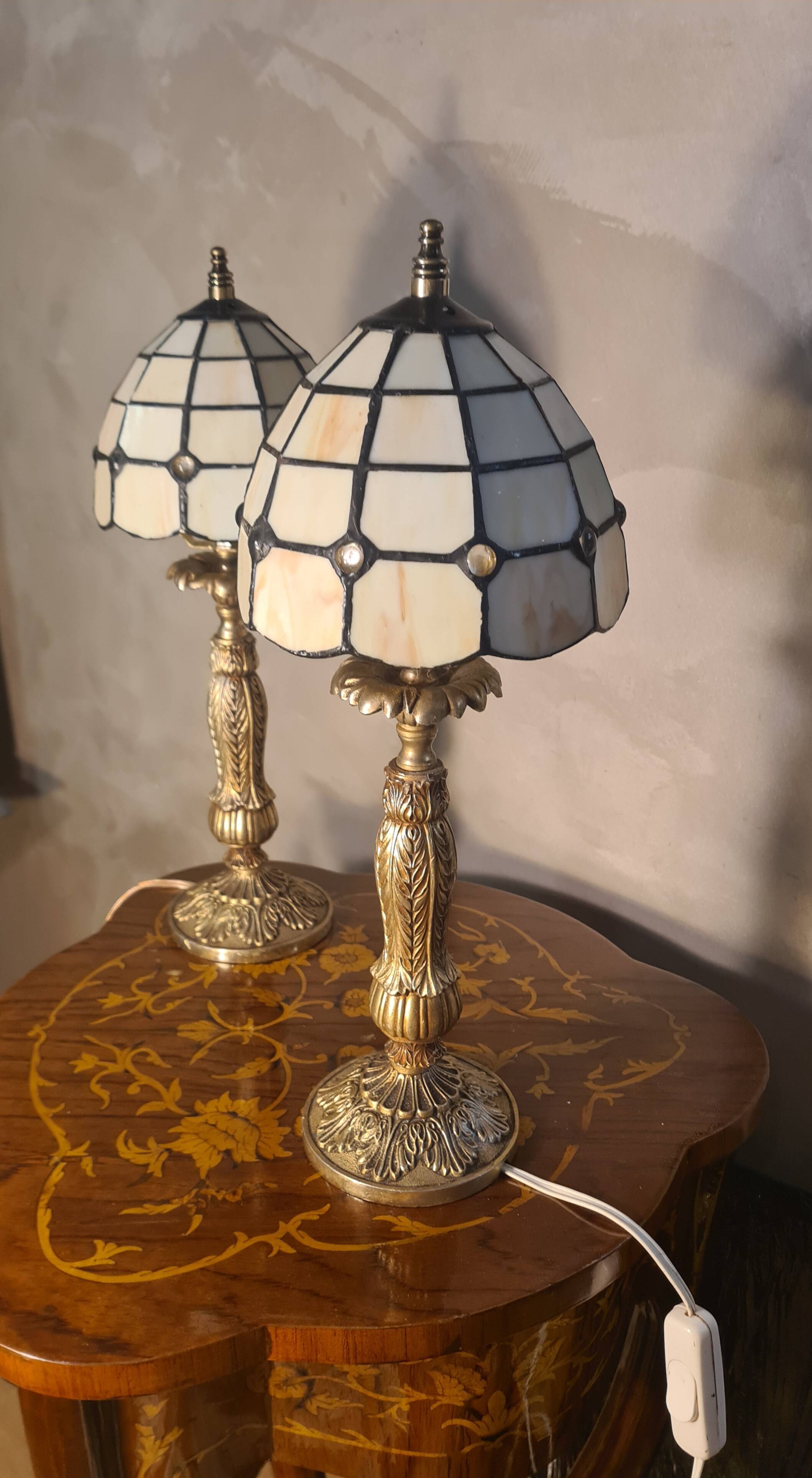 pair of bedside lamps in gilded bronze with glass shade
