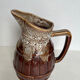 Glazed ceramic pitcher