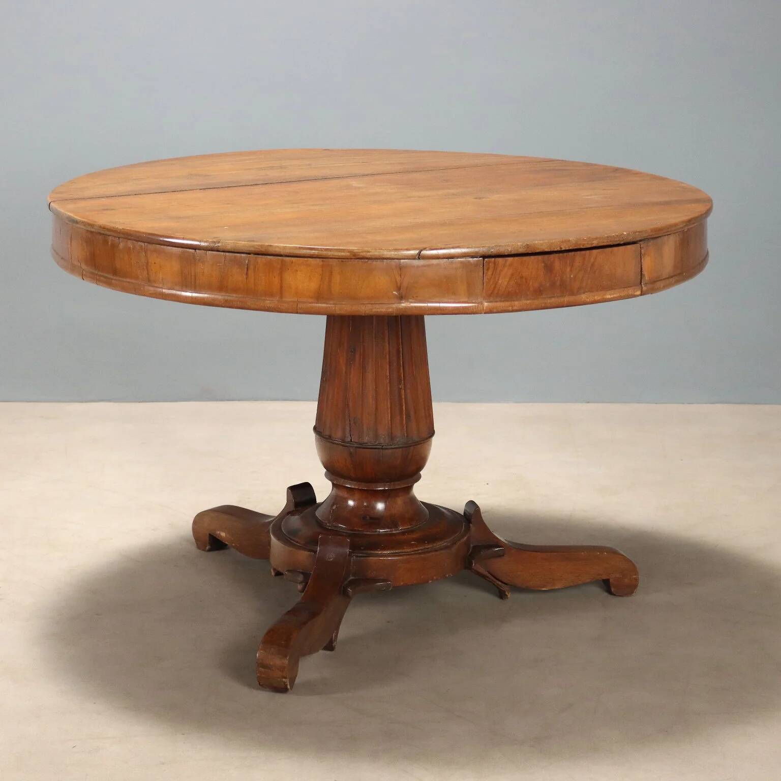 Antique walnut round table with drawers, Italy, 19th century