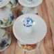 Set of 6 antique egg cups in porcelain from Paris + wooden stand